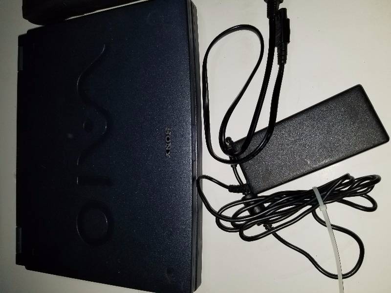 lot 69 image: 3 laptops with power cords