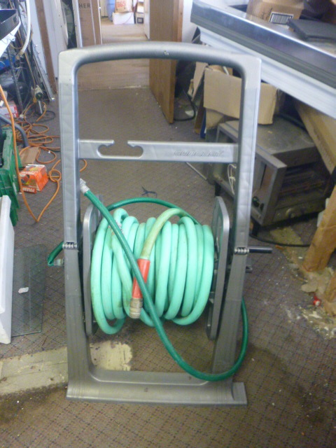 lot 151 image: Garden Hose and Reel