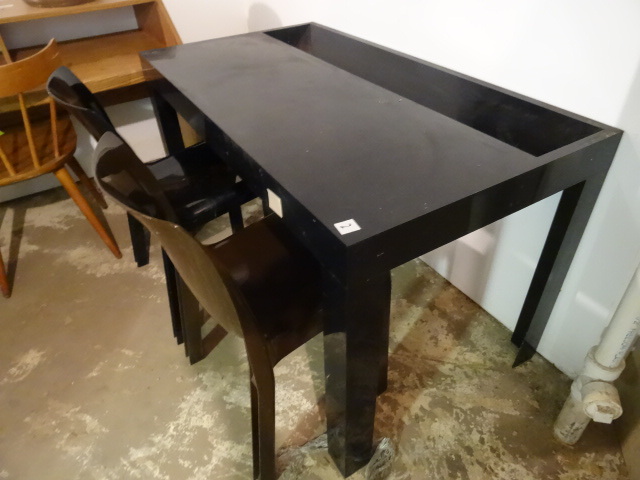 Modern 2 chair desk. Black plastic....