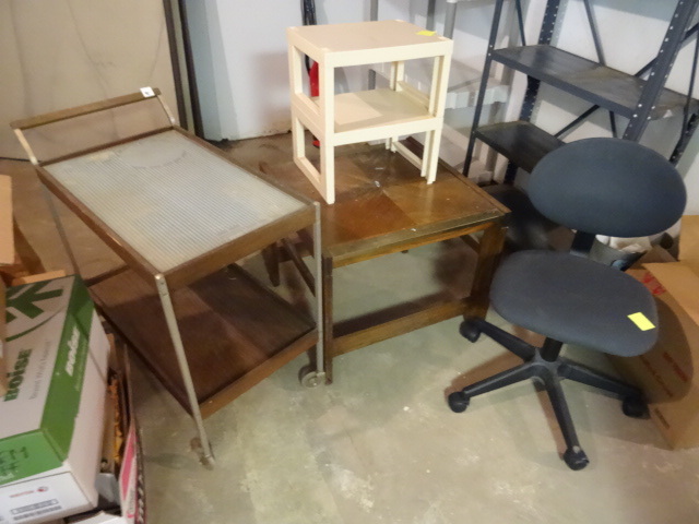 Office  desk chair. Tea cart on whe...