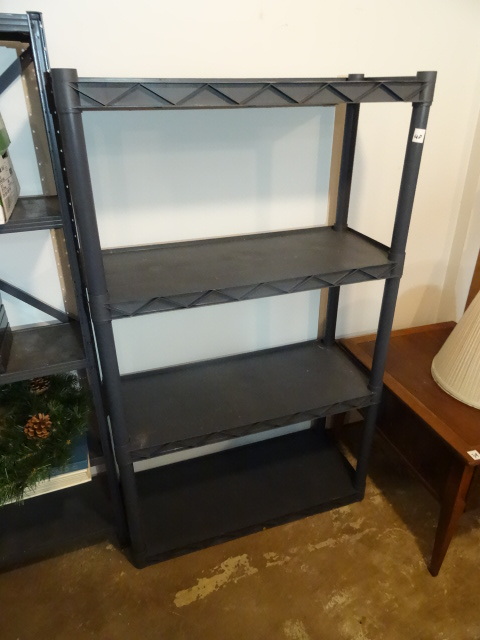 1 Plano plastic shelving unit. 34 x...