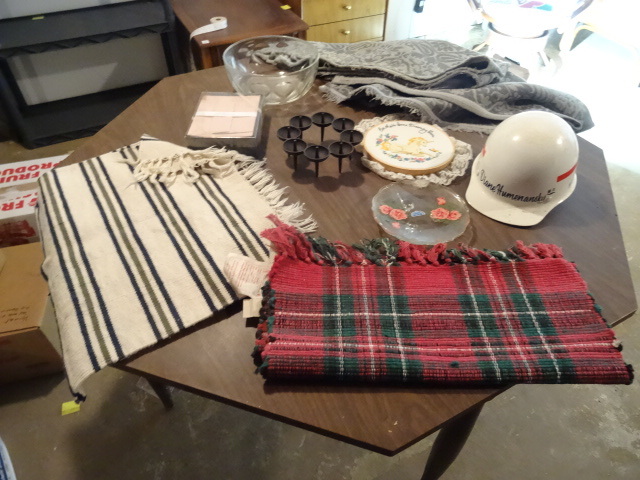 Misc throw rugs. Glass bowl. Hard h...