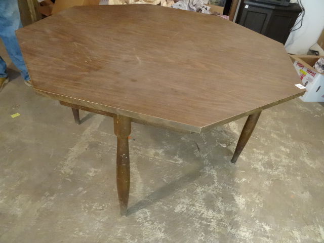 Wood octagon dinette table. 48 x 28...