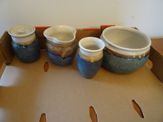 4 pieces of matching pottery...
