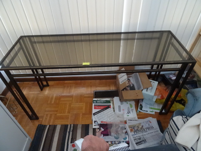 Glass and metal sofa table. 58 x 20...