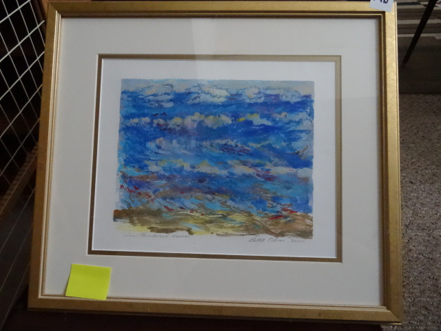 Framed print. Low clouds and waves....