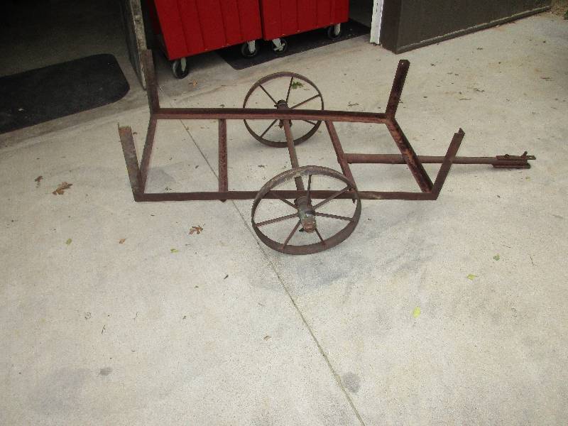 Vintage metal wheeled trailer. 45 x...