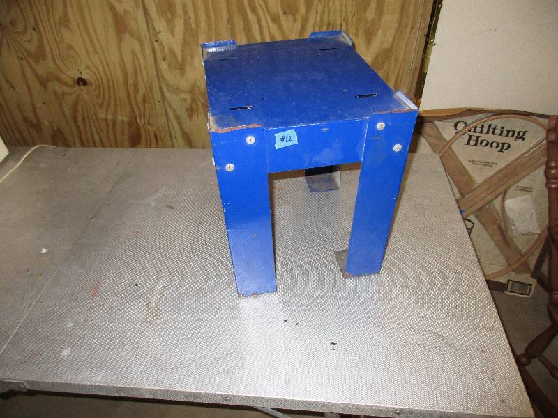 Blue metal stand. 15 x 12 x 14...