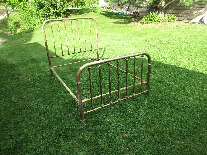 Antique brass bed. Headboard, footb...