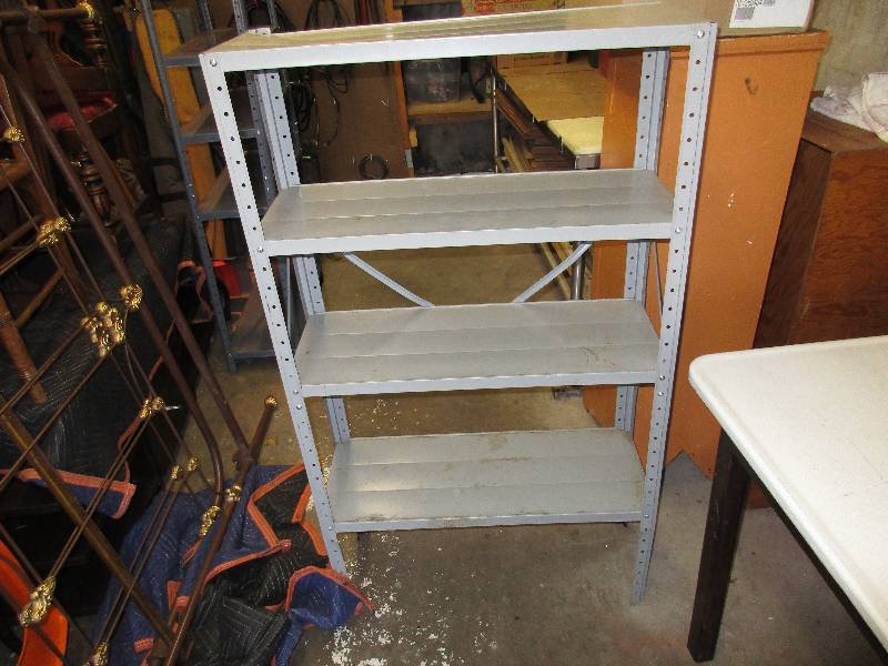 Metal shelving unit. 30 x 11 x 52...