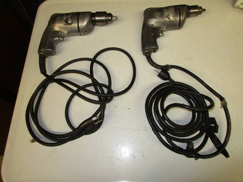 2 Vintage Black and Decker drills. ...