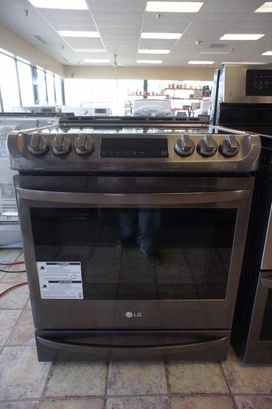 lot 9 image: New - Scratch & Dent LG Model # (LSE4613BD) - Slide-in Electric Convection Range - 6.3 cu ft - Black Stainless Steel -Tested Works - MSRP $ 1999.99