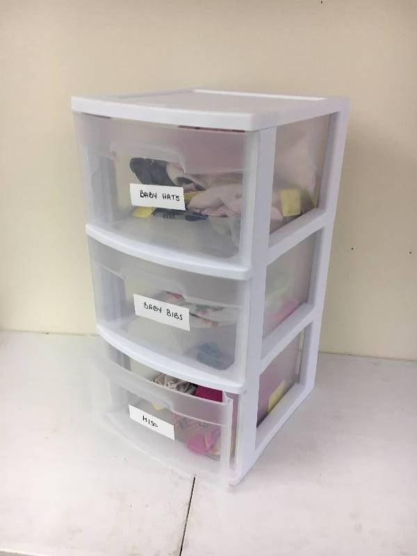 lot 54 image: 3 Drawer tote w Baby Items