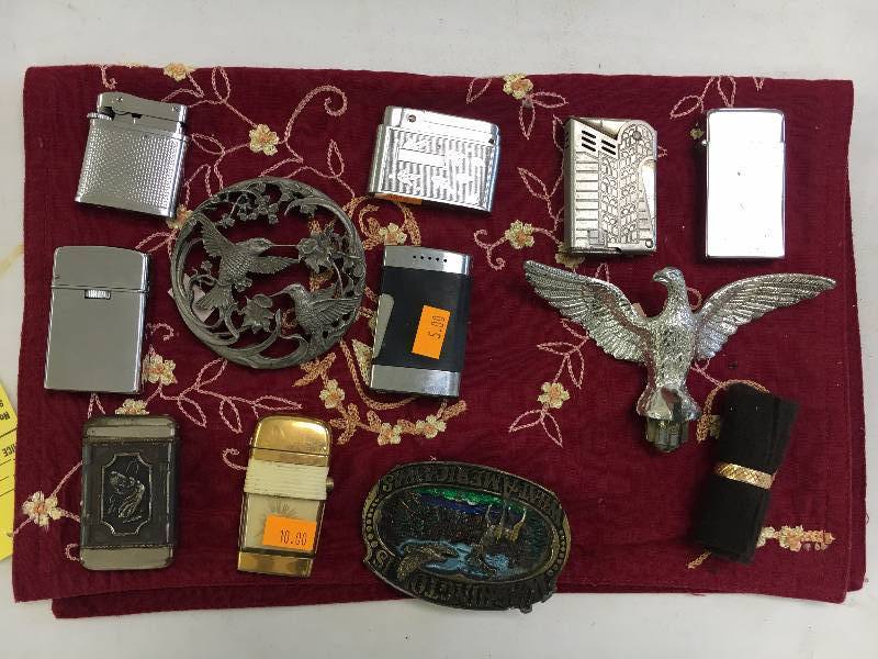 lot 70 image: Lot of Zippos and Belt Buckels