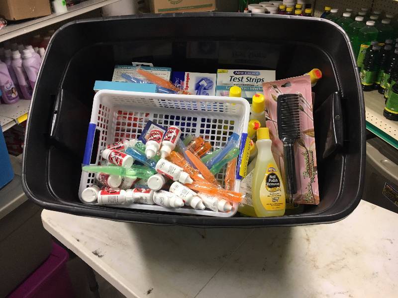 lot 177 image: Tote of Bandaids, Nail Polish Remover, Etc.