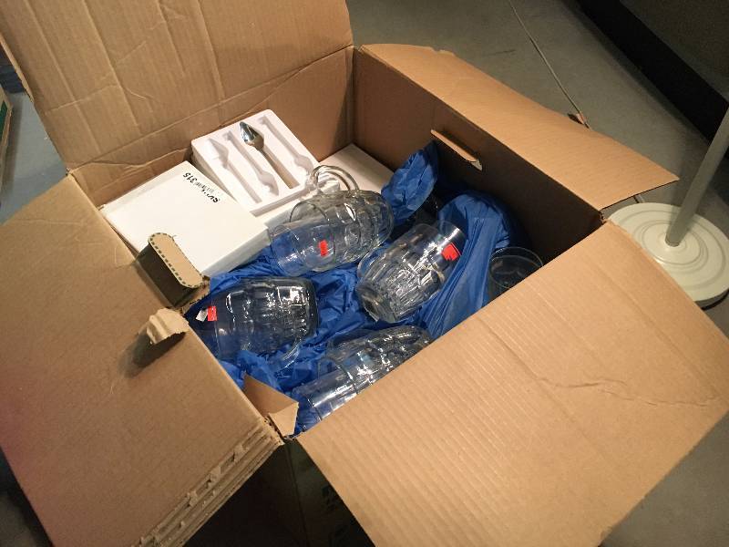 lot 225 image: Tote of Glass Mugs and Silverware