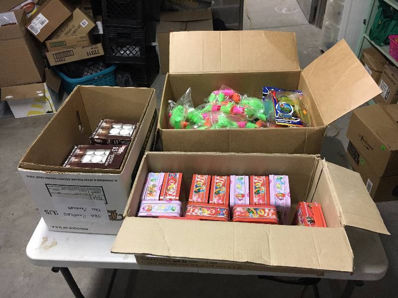 lot 233 image: Tote of Lunch Boxes, Candles, Toys, Etc.