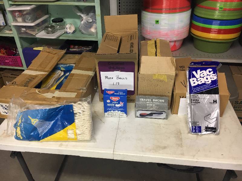 lot 272 image: Boxes of mop heads, moth balls, brush, vac bags.