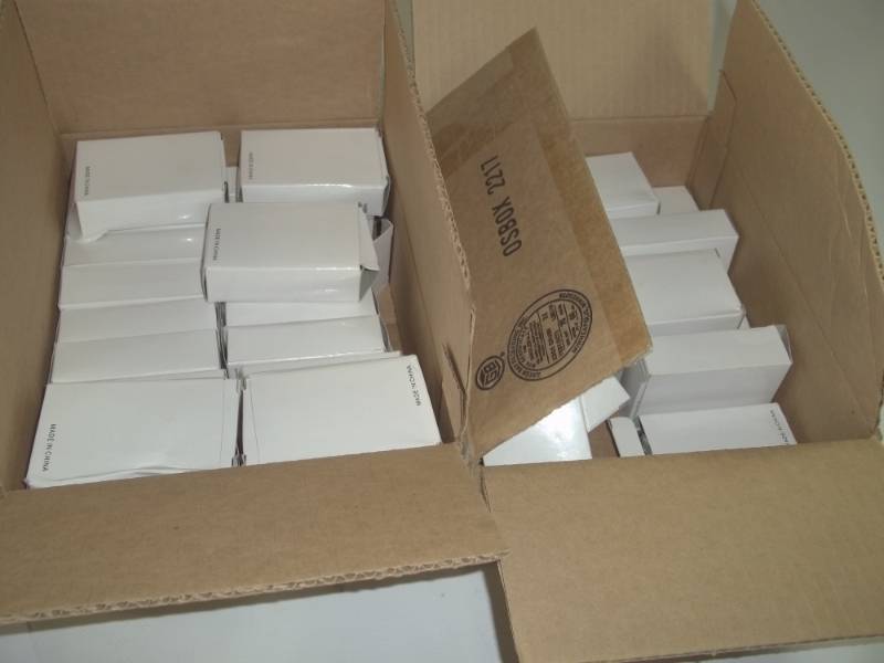 lot 53 image: 35 Radios with Earphones