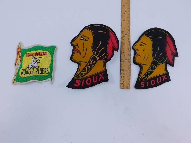 lot 39 image: 2 Vintage Sioux Patches and North Dakota Rough Riders Patch