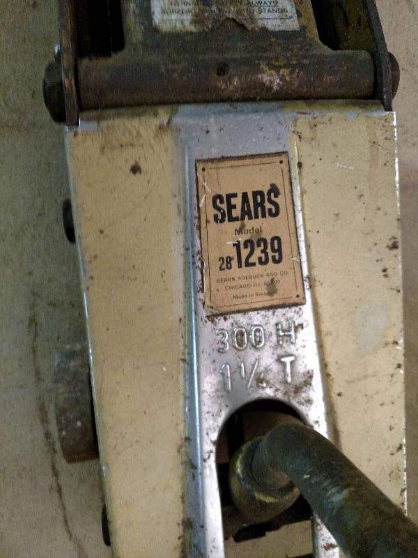 lot 23 image: Sears 1 14 Ton Floor Jack, Needs O...