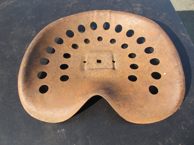 lot 95 image: Antique Iron Tractor Seat