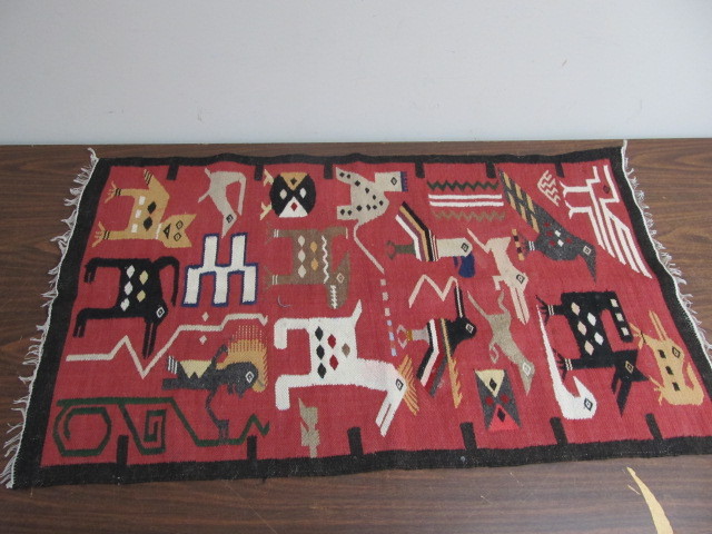 lot 137 image: Vintage Hand Knotted Animal Figure Rug