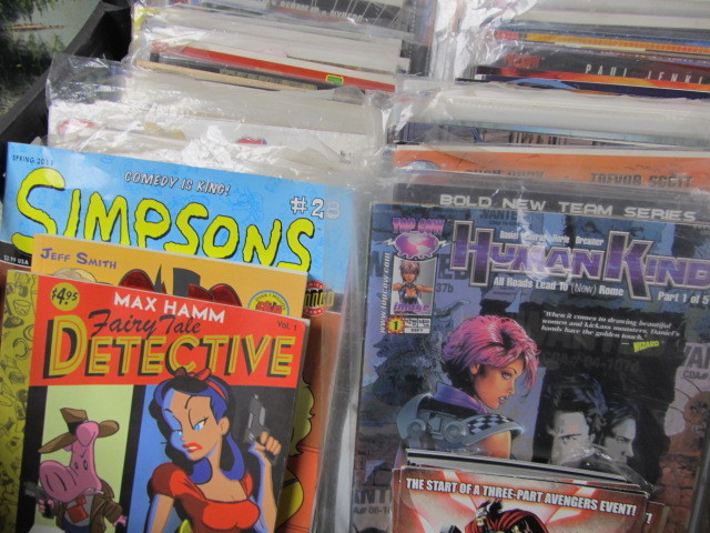 lot 217 image: LARGE Lot of Assorted Comic Books, Posters etc.