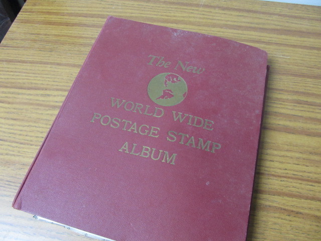 lot 218 image: Vintage World Stamp Album wStamps