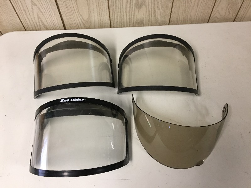 lot 26 image: 3 Vintage Sno Rider Helmet Shields