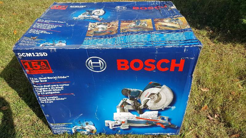 lot 1 image: New, Bosch 12 Sliding Compound Miter Saw, Double Bevel