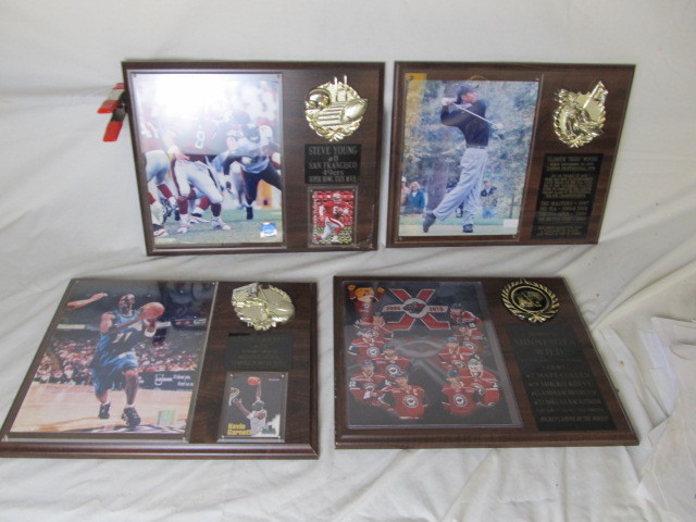 lot 59 image: Sports Plaques - Tiger Woods, Steve Young, Kevin Garnett, MN Wild