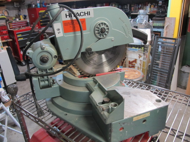 lot 85 image: Hitachi Miter Box w New Blade