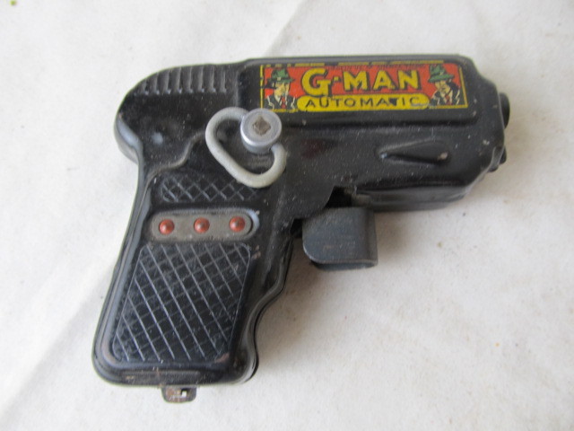 lot 193 image: G-Men Automatic Friction Toy Gun