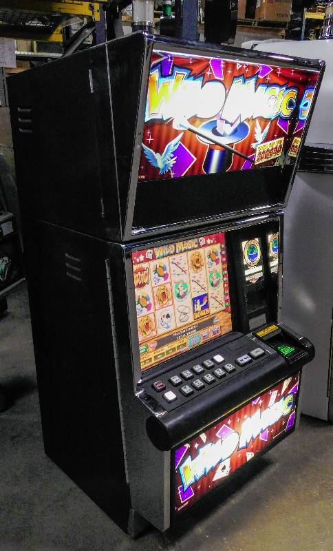 lot 1001 image: KONAMI WILD MAGIC VIDEO SLOT MACHINE