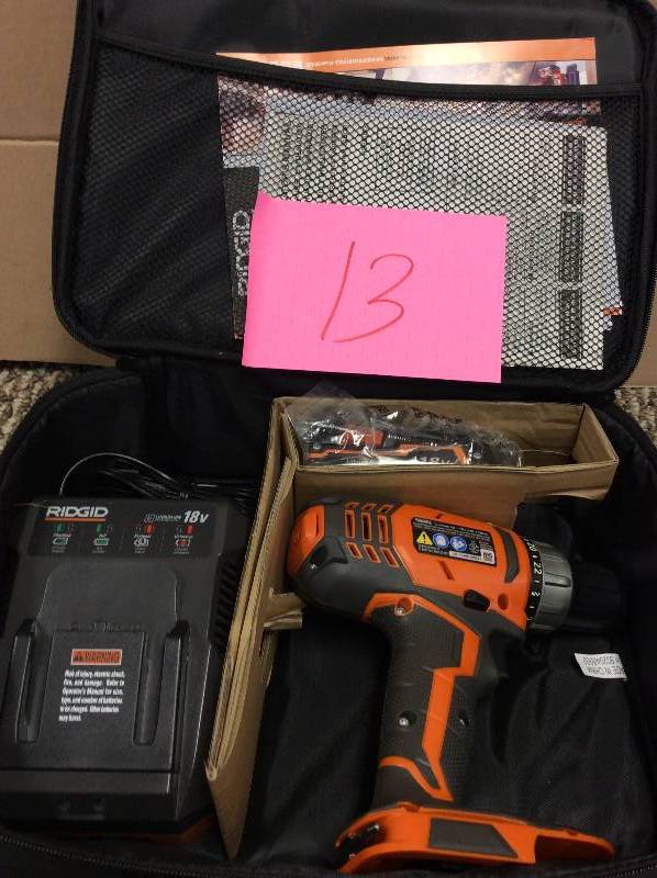 lot 13 image: Ridgid 18-Volt Cordless Lithium-Ion 12 in. Compact DrillDriver Kit not used