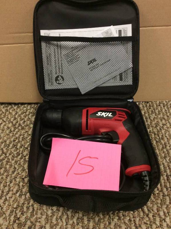 lot 15 image: Skil 6.5 Amp Corded Electric 38 in. Variable Speed DrillDriver with Carrying Case not used