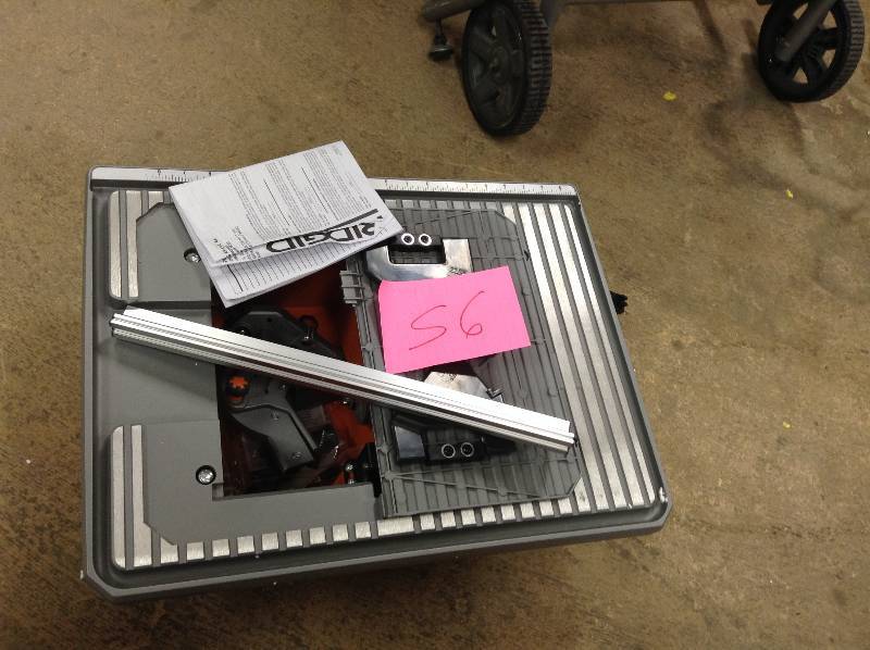lot 56 image: Ridgid 7 in. Job Site Wet Tile Saw
