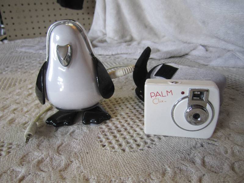 lot 96 image: Computer Penguin and Palm Clix Came...