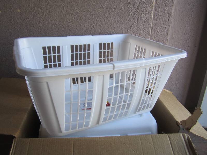 lot 130 image: Case of 8 Rubbermaid Laundry Basket...