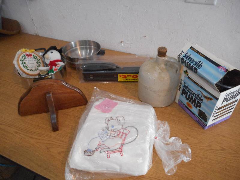 MISC LOT--PANS, PUMP, TOWELS, THREE HOLE PUNCH,AND JUG