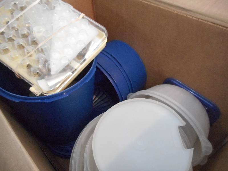 BOX LOT OF TUPPERWARE, CAKE DECORATING FROSTING KIT AND BISCOTTI MAKING GUN