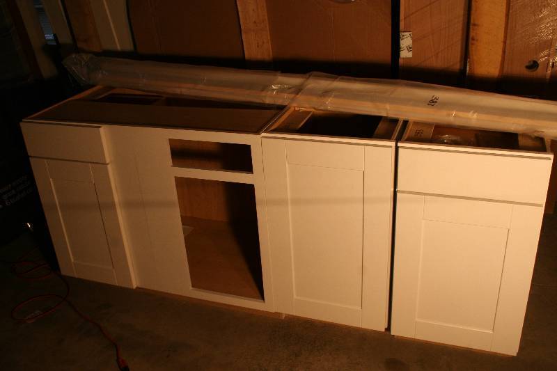 lot 204 image: Cabinet Set, Crown Molding and Trim Board