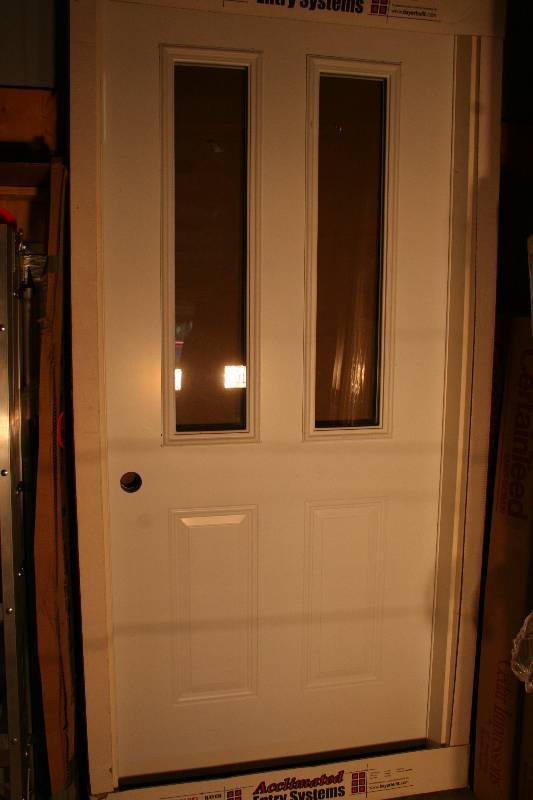 lot 215 image: Pre Hung Insulated Exterior Door with Glass