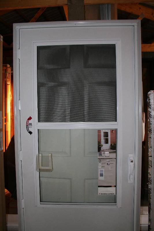 lot 255 image: Display Storm Door