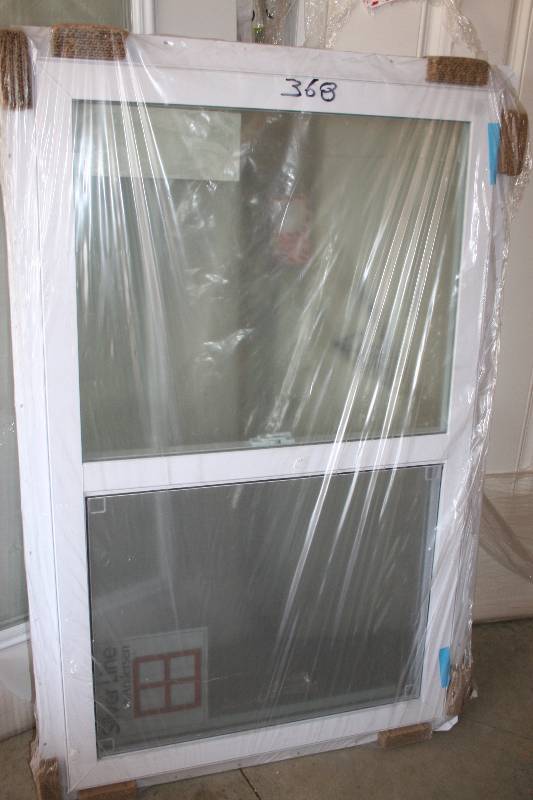 lot 442 image: Sliding Vinyl Window