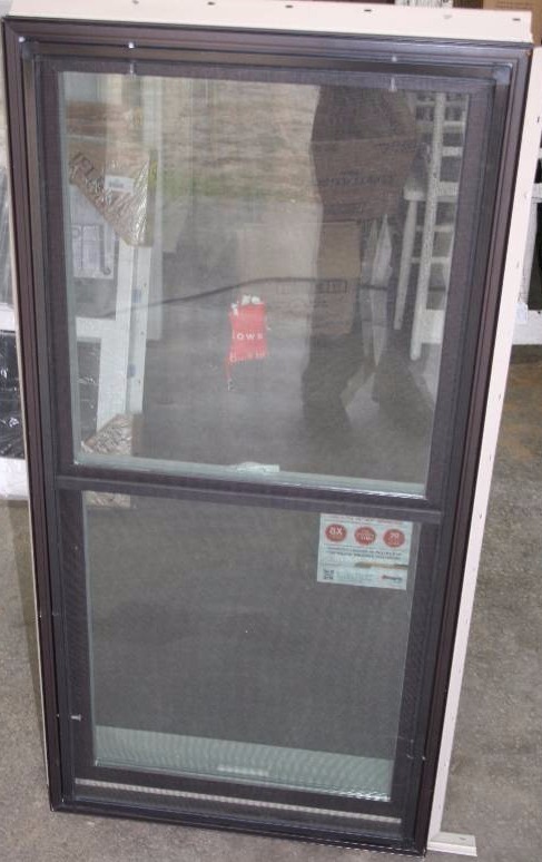 lot 605 image: Verticle Slider Window