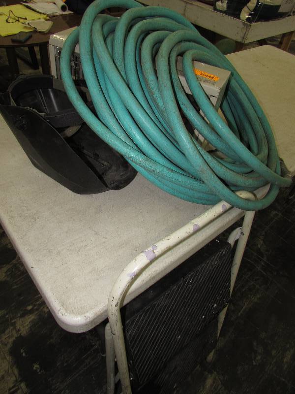 lot 563 image: WELDING HELMET, GARDEN HOSE, STEP STOOL AND SPACE HEATER
