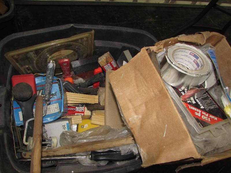 lot 565 image: LARGE TOTE OF MISC GARAGE ITEMS, NAILS, SHIMS, DRYWALL TOOLS AND MORE