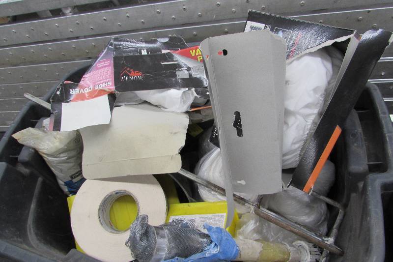 lot 569 image: TOTE OF DRYWALL ITEMS, ROLLS OF PLASTIC, TAPE, SHOE COVERS, MIXING PADDLE AND MORE